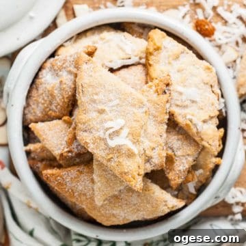 Coconut Almond Sourdough Crackers Recipe for Crispy Homemade Snacks 7 Close up view of coconut sprinkled over crackers.