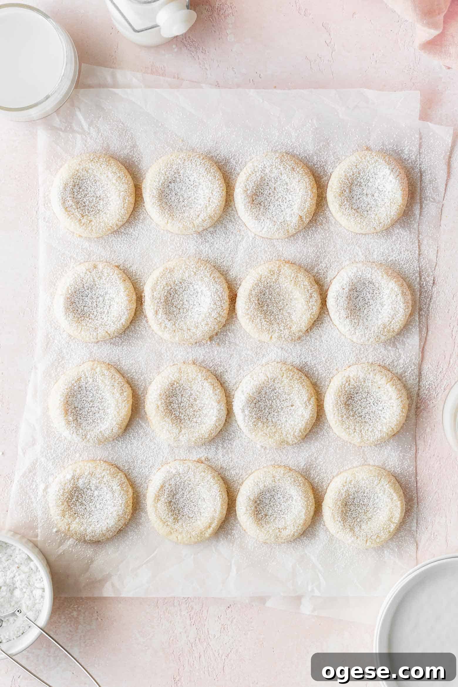Cookies dusted with powdered sugar.