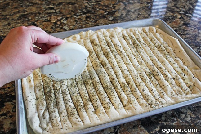 Parmesan Garlic Bread Twists Recipe: Crispy Pull-Apart Bread 12 Cutting strips