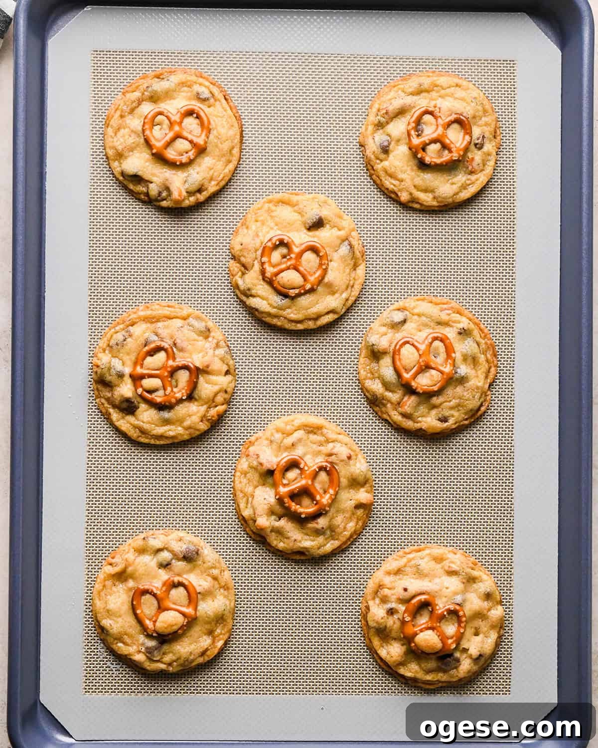 Salted Pretzel Chocolate Chip Cookies: Sweet Meets Crunch 21 8 Chocolate Chip Pretzel Cookies on a baking sheet after baking
