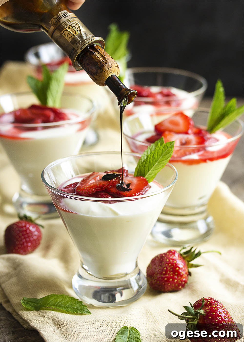 Balsamic strawberry mascarpone mousse Martini glasses filled with mascarpone mousse and topped with fresh strawberry sauce and drizzled with balsamic vinegar.