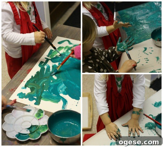 Toddler Christmas Craft: Tissue Paper Wreath 4 kids painting their hands