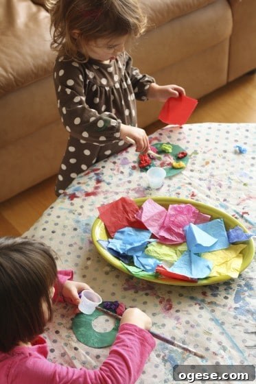 Toddler Christmas Craft: Tissue Paper Wreath 5 kids making tissue paper wreath ornaments