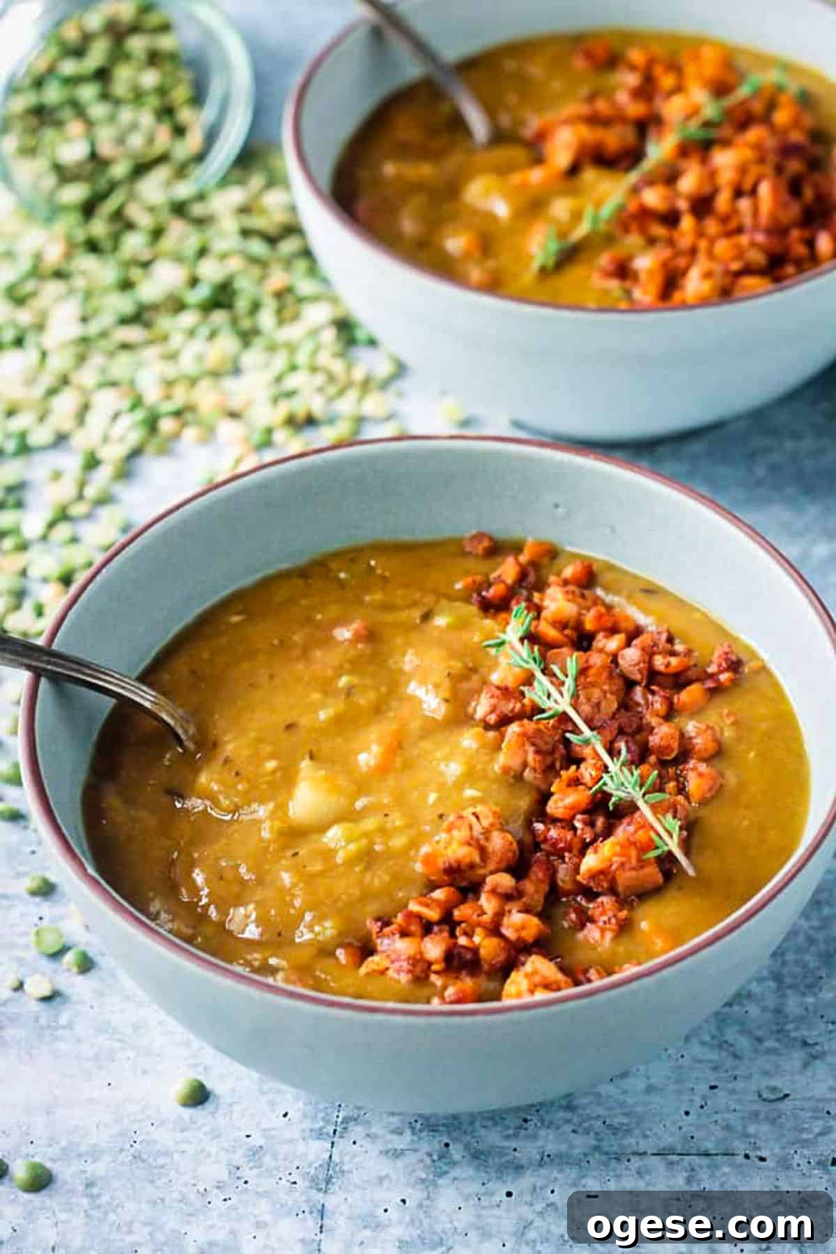 Instant Pot Vegan Split Pea Soup with Smoky Flavor 6 Spoon in a bowl of split pea soup.
