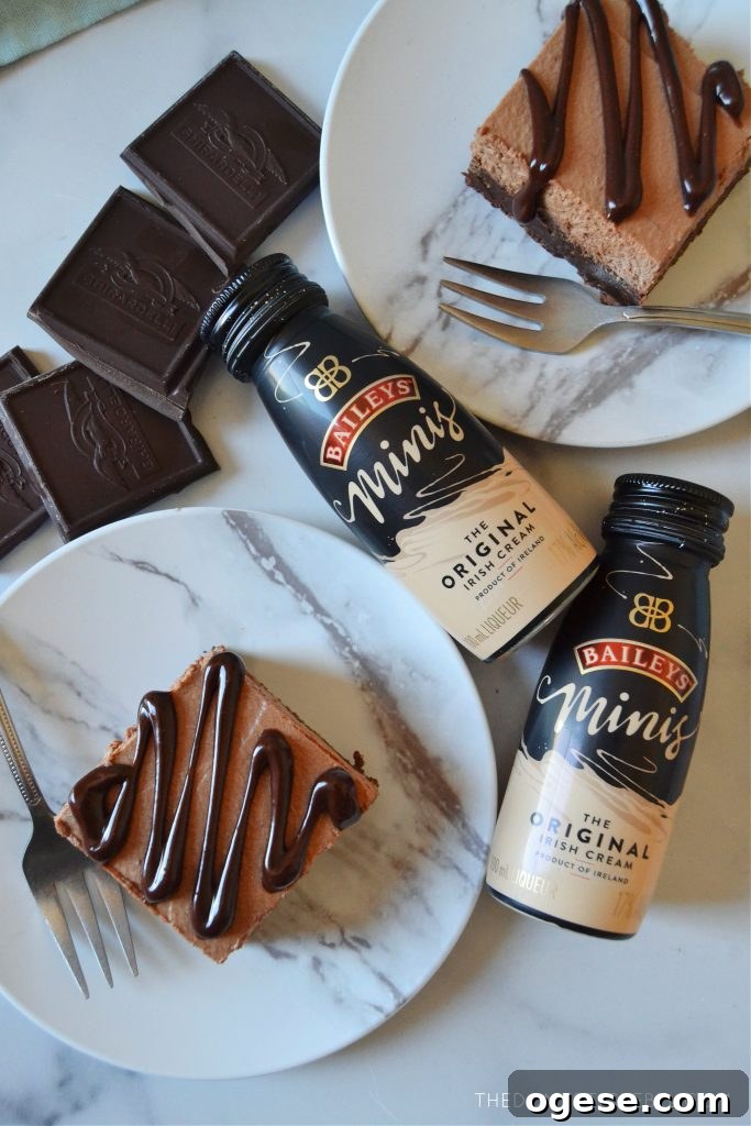 An arrangement of Bailey's mousse brownies with chocolate squares and mini bottles of Bailey's