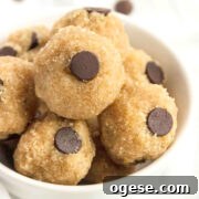 Chocolate chip keto cookie dough balls in a small white bowl.