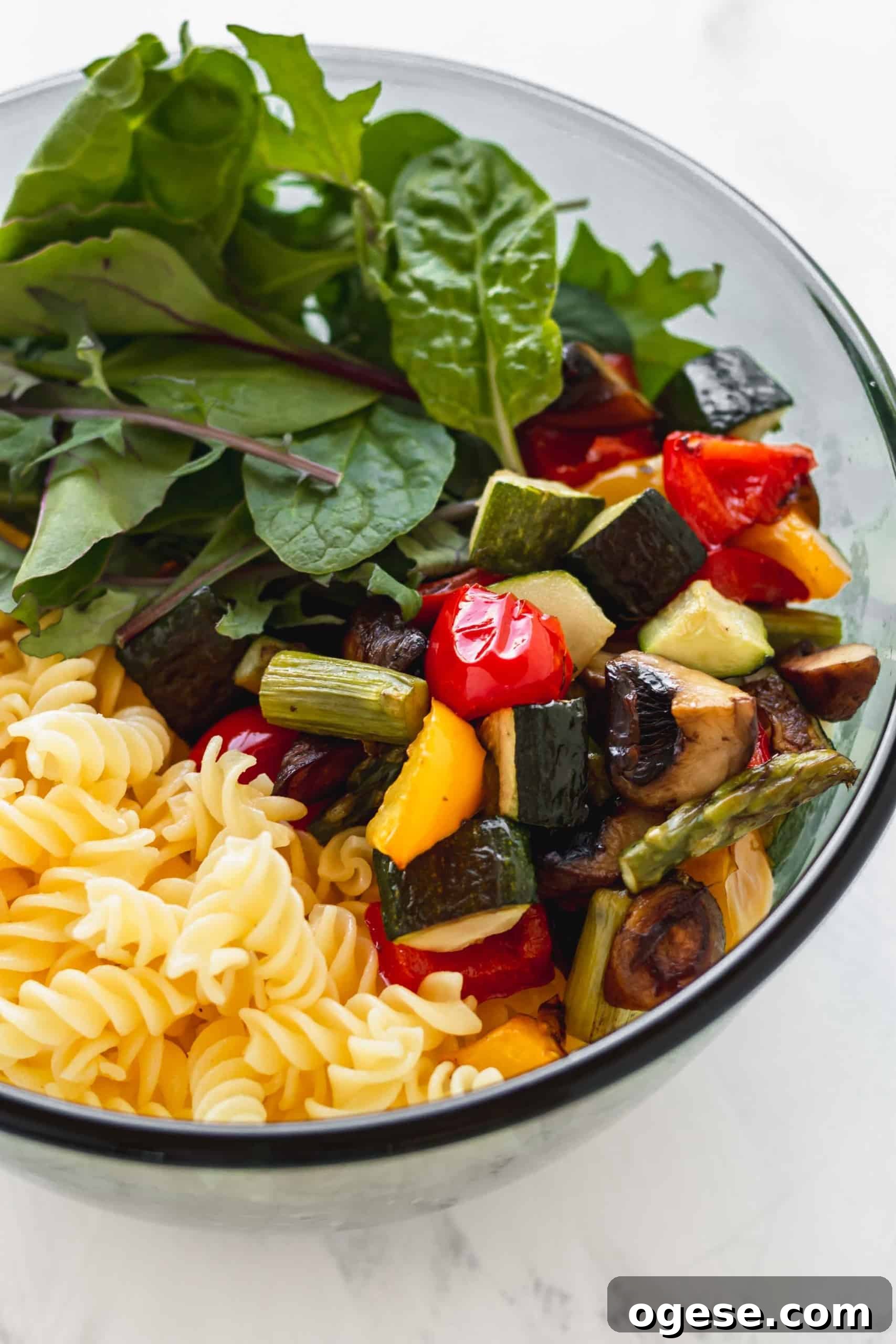 Mediterranean Vegan Pasta Salad with Lemon Herb Dressing 3 Ingredients for pasta salad in a bowl