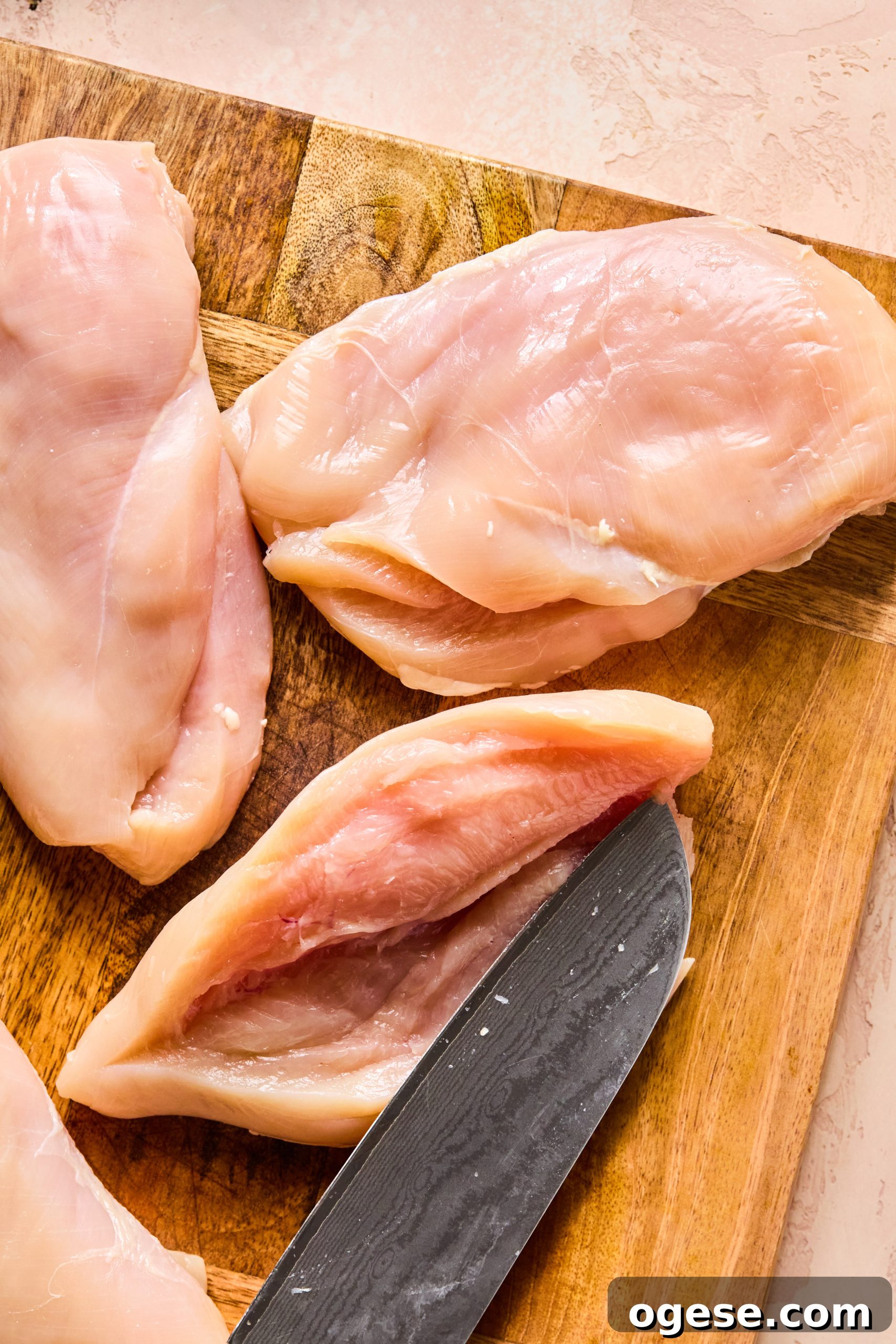 3 chicken breasts sliced to create a pocket for an asparagus and sun dried tomato filling