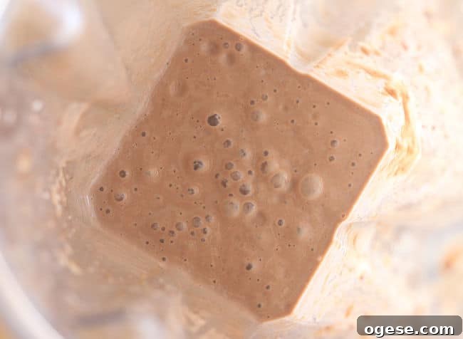 Creamy Chocolate Peanut Butter Banana Smoothie 5 Chocolate smoothie in a blender.