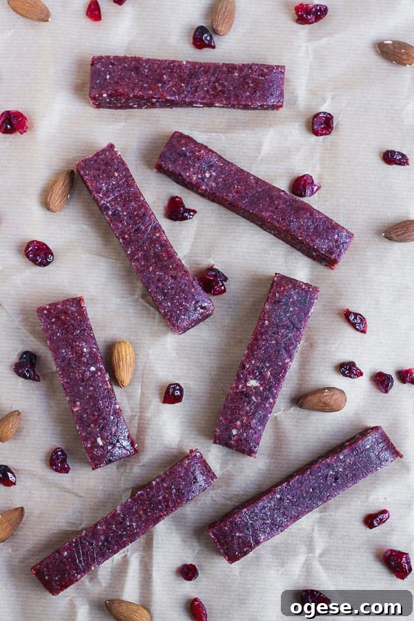Raw Cranberry and Nut Energy Bars on baking parchment