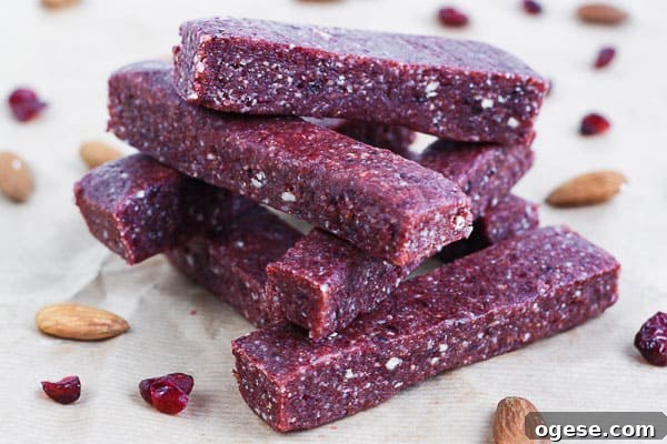 Raw Cranberry and Nut Energy Bars on baking parchment