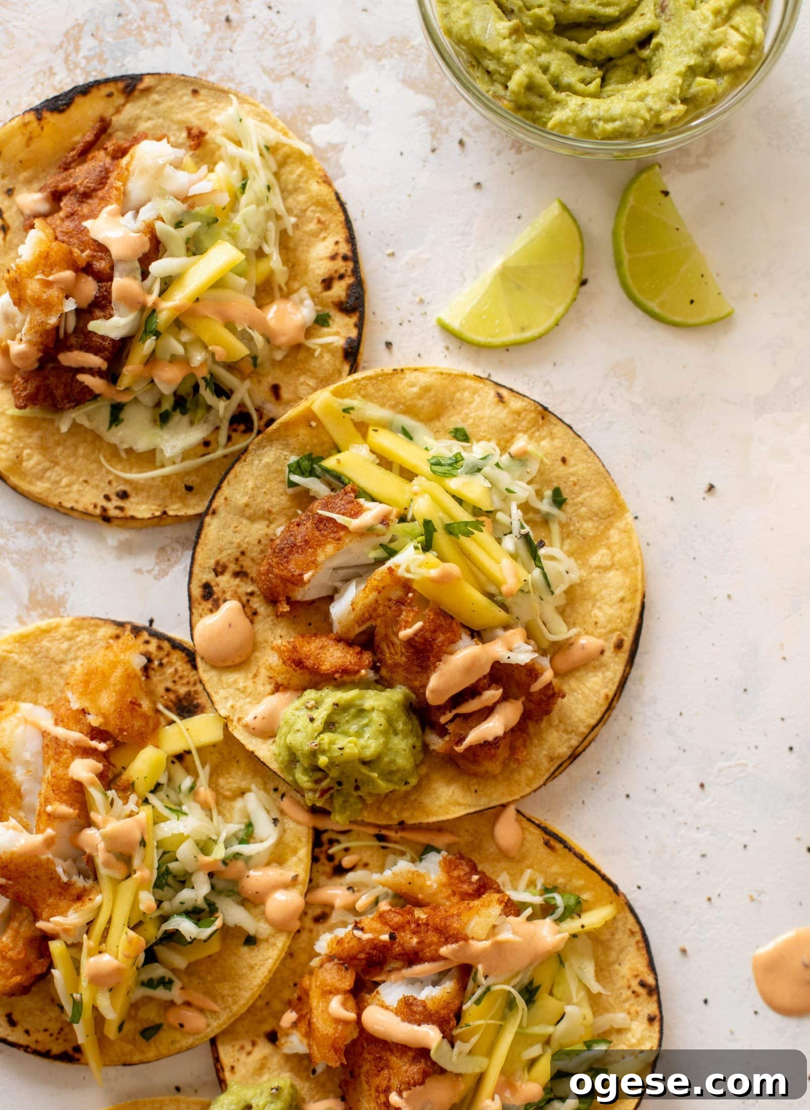 crispy fish tacos with mango slaw