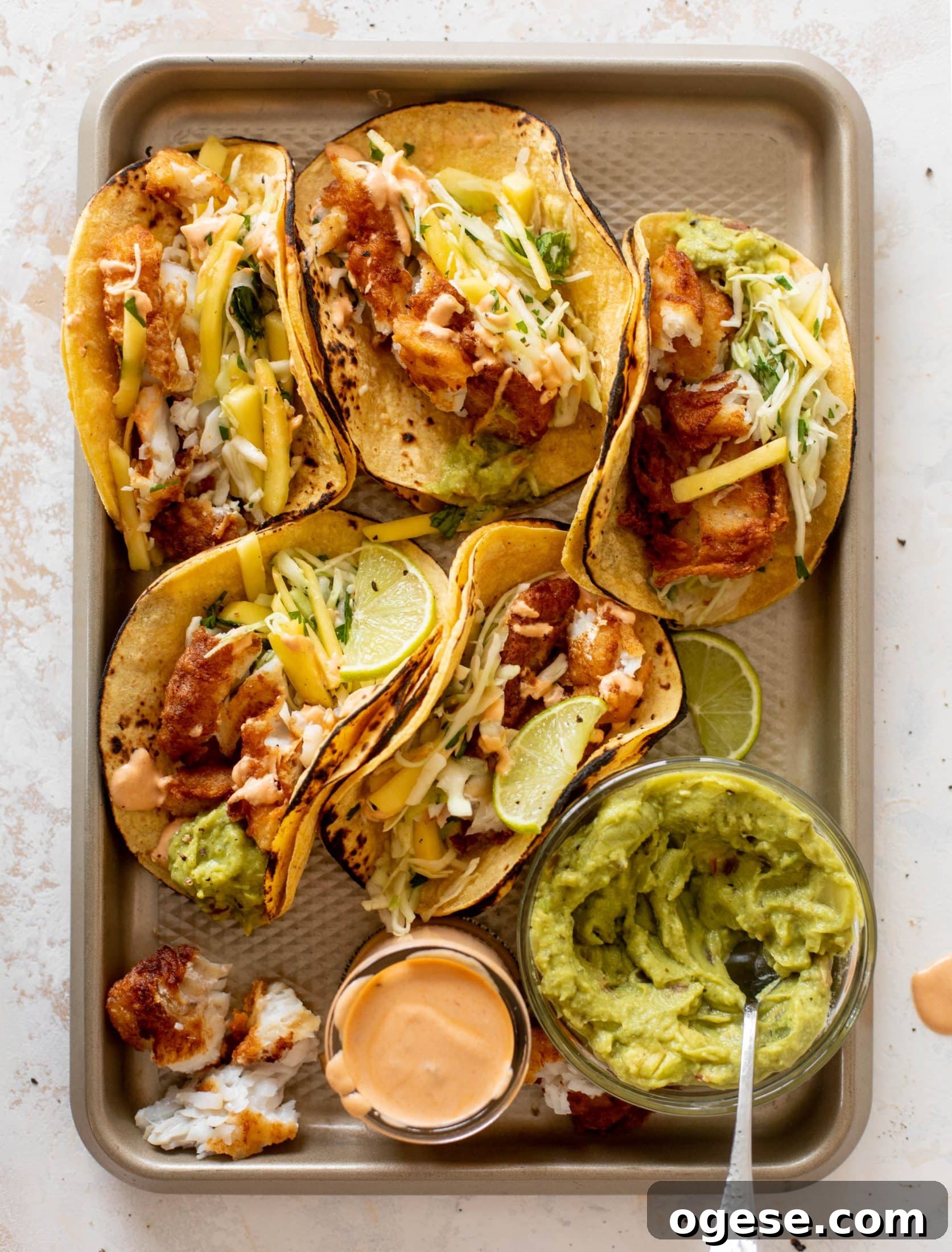 crispy fish tacos with mango slaw