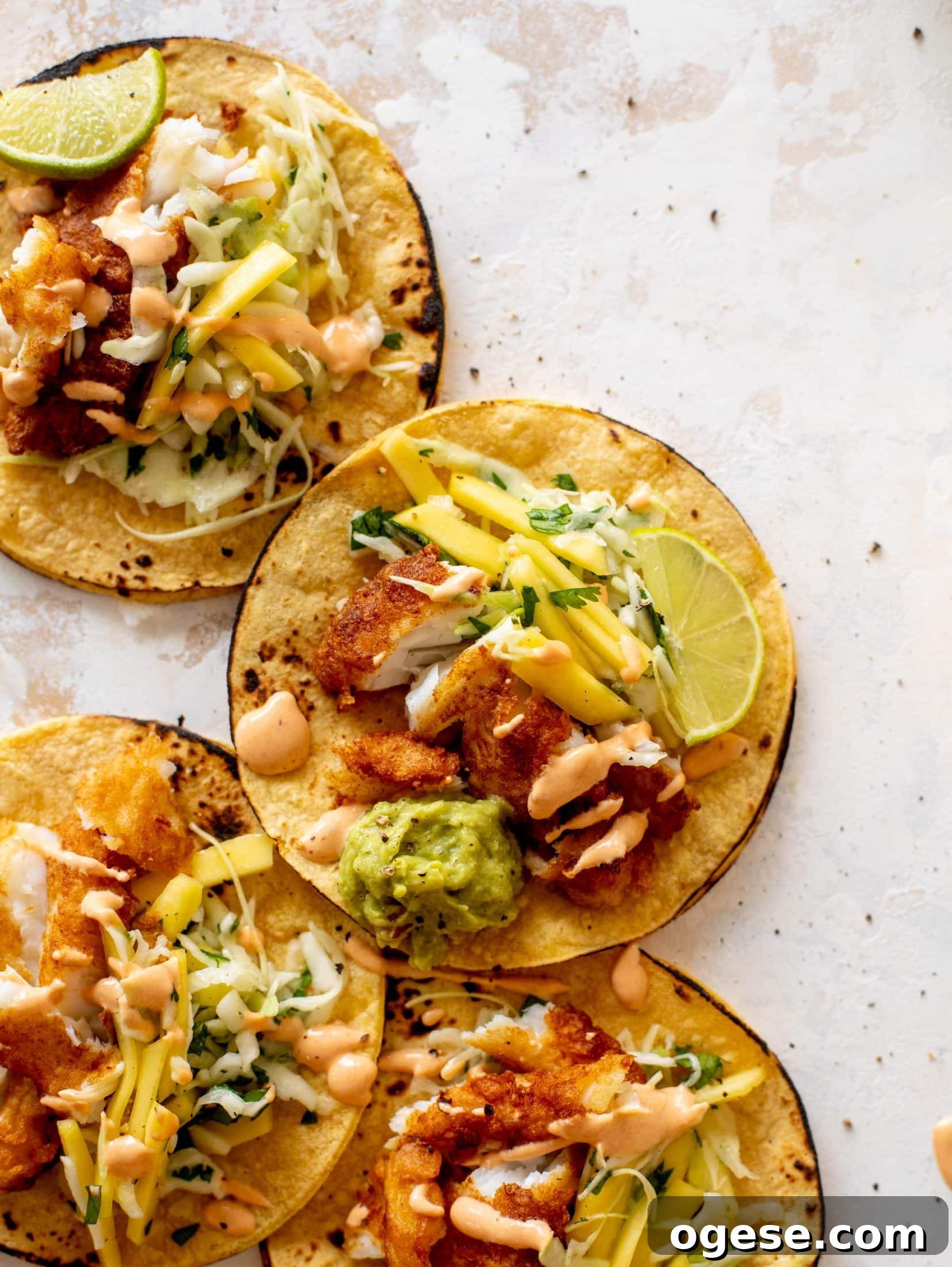 crispy fish tacos with mango slaw